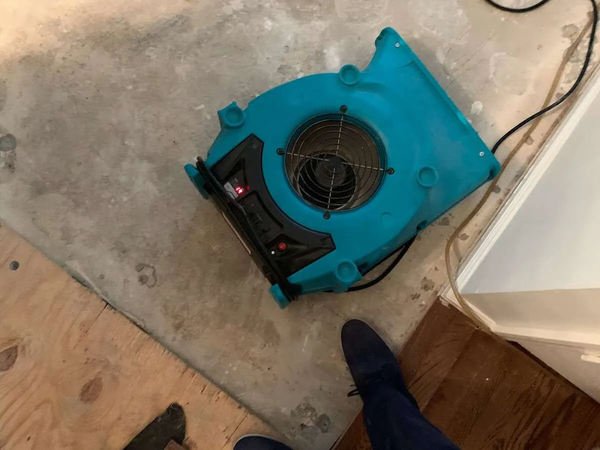 Air mover drying subfloor during Leak Detection & Repair in West Puente Valley